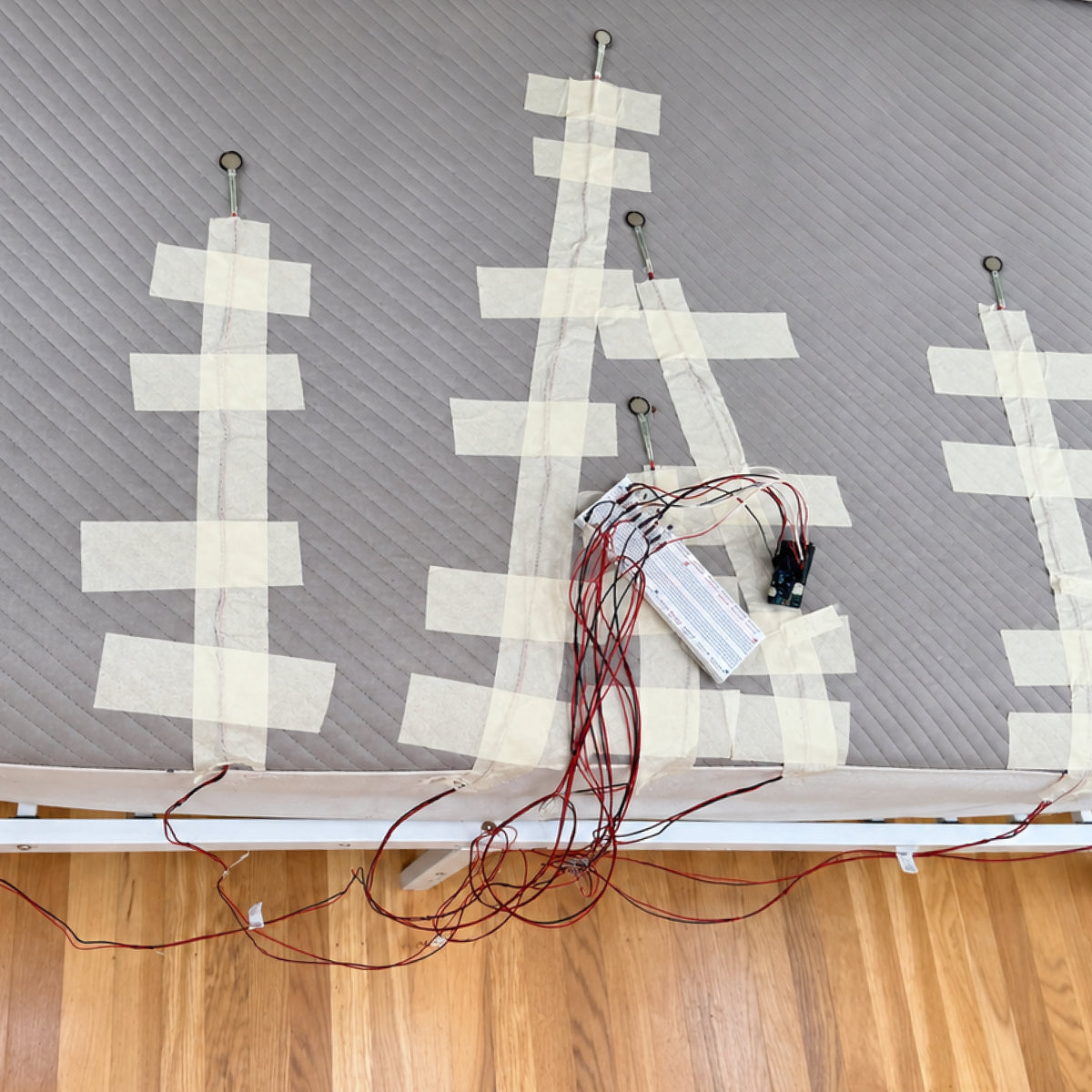 Early Orion prototype wiring taped to a workbench