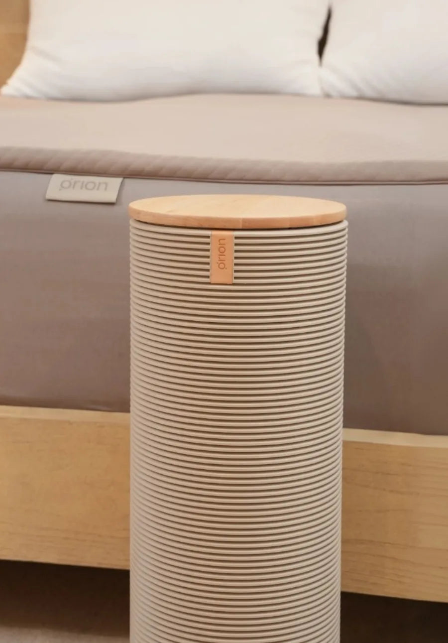The Orion Sleep System — bed with the Control Tower in a warm, Japanese-inspired bedroom